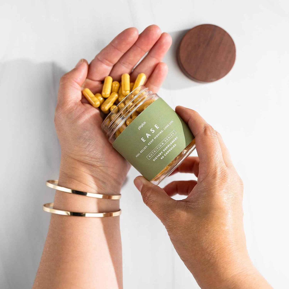 Plexus Ease Capsules - Contains a blend of botanicals and nutrients designed for general wellness and post-activity comfort