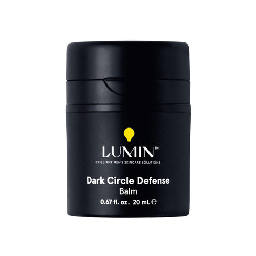 Lumin Men’s Dark Circle Defense Balm jar – a premium grey container of hydrating eye cream for men's grooming.